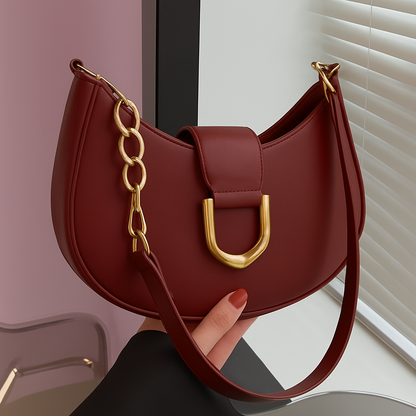 Luxury-inspired maroon handbag with golden strap