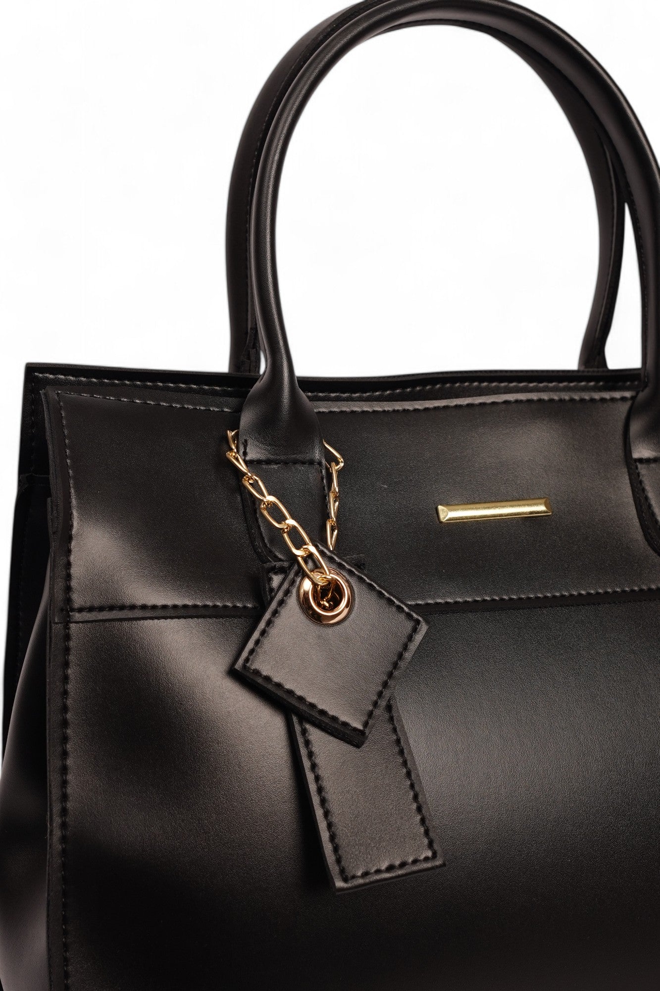 Classy black handbag with charm