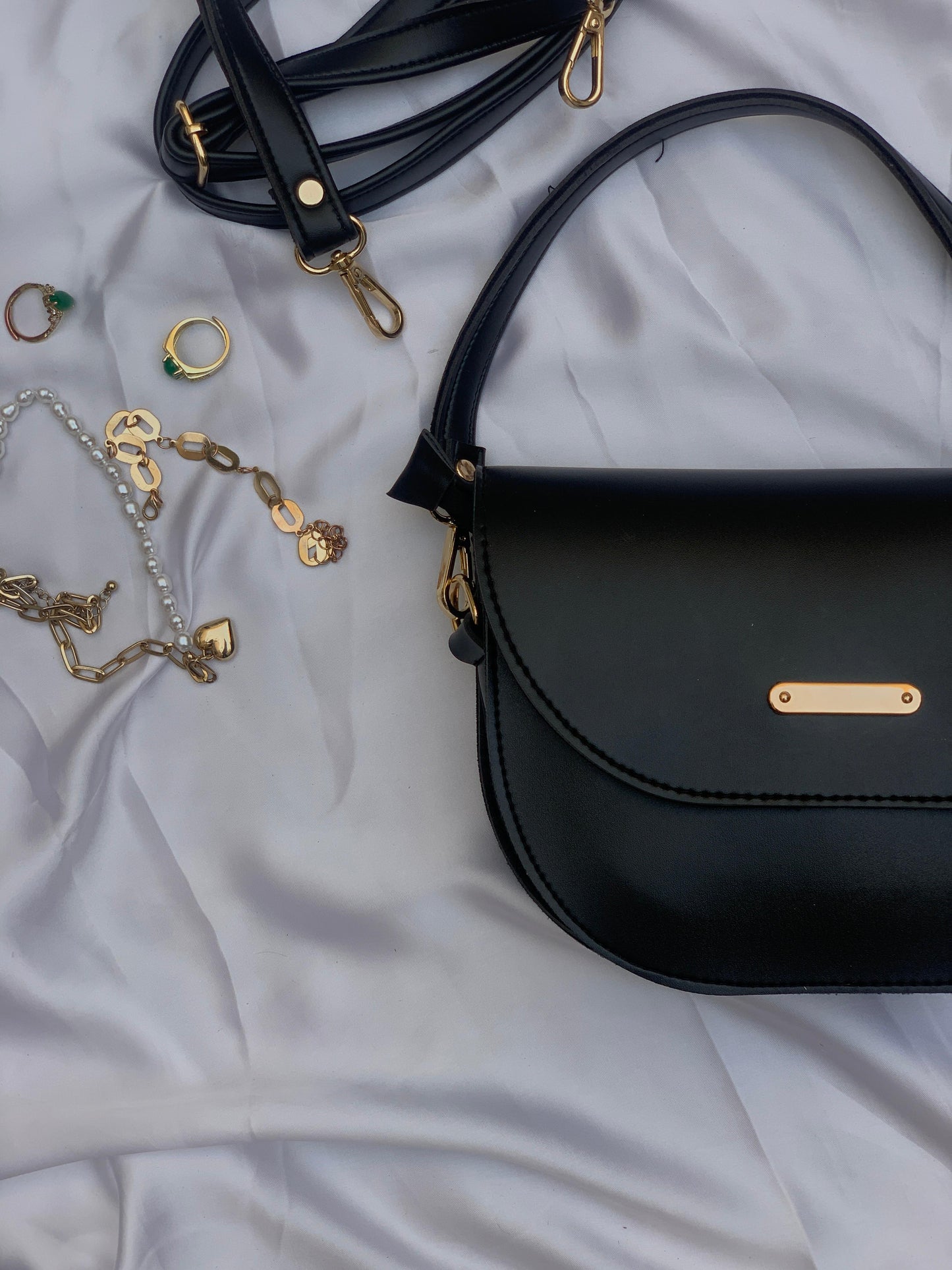 Ladies black sling purse