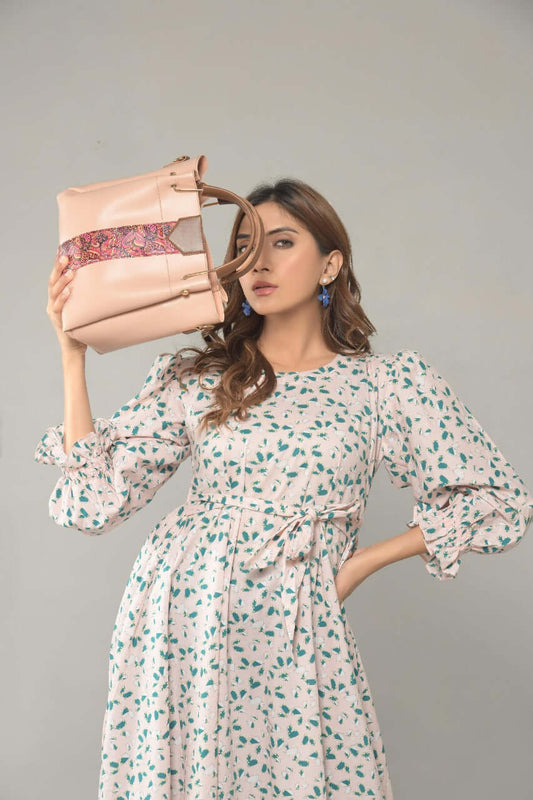 Pink women’s handbag set with matching accessories